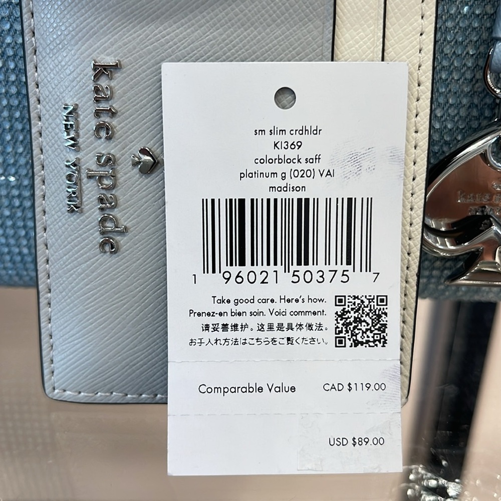 Kate Spade Madison Small Slim Card Holder
Platinum Grey Multi
NWT - Picture 7 of 16